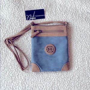 Brand New!! Super cute navy and brown crossbody!